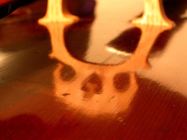 Cello Bridge Reflection